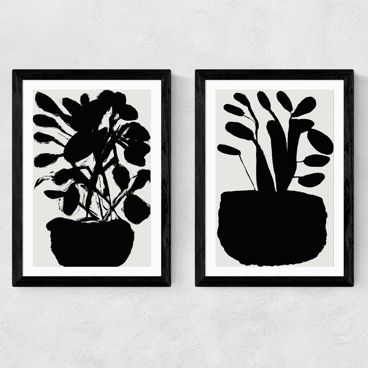 potted plant silhouette art print set by cartissi in black frame