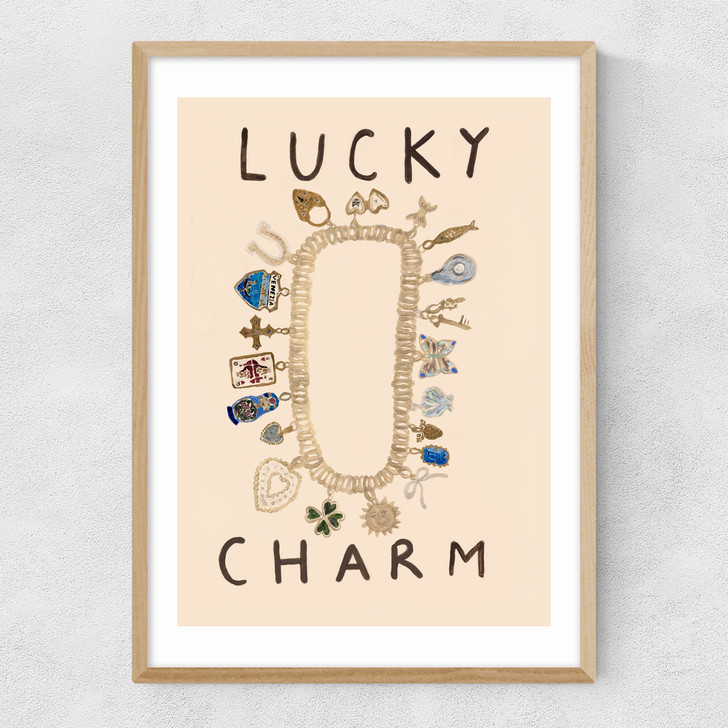 lucky charm art print by she snacks and paints in oak frame