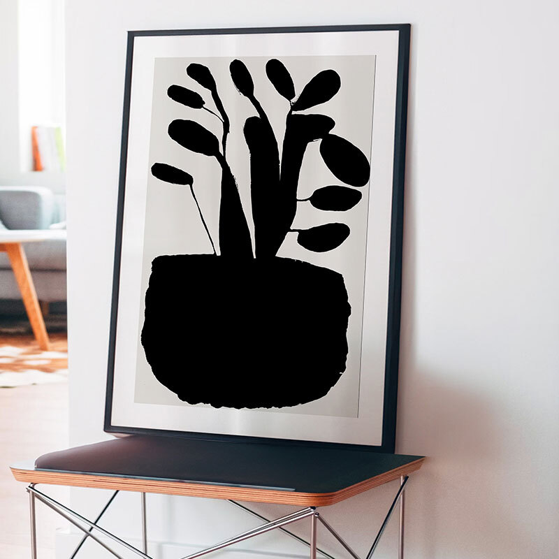 potted plant silhouette II art print by cartissi in black frame