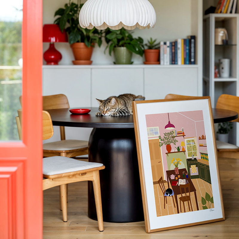 cosy cottage art print by elsa eleni in oak frame