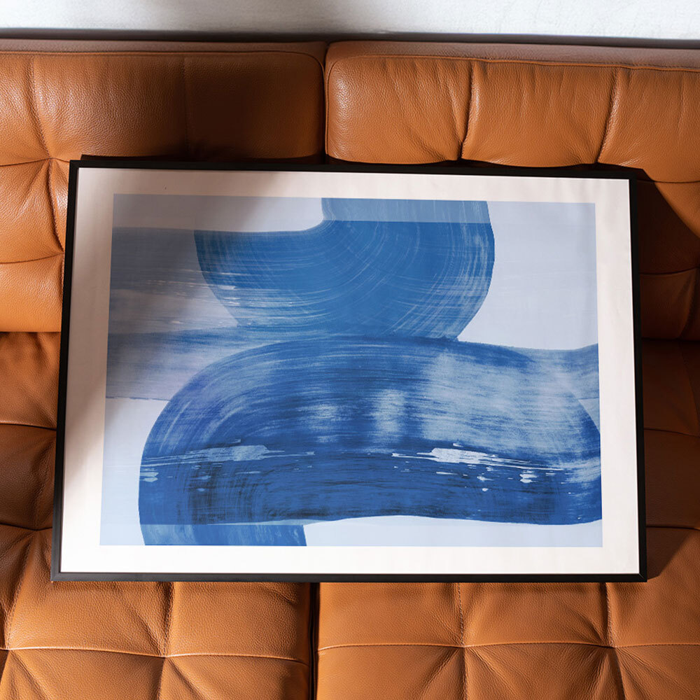 abstract shapes blue art print by iris lehnhardt in black frame