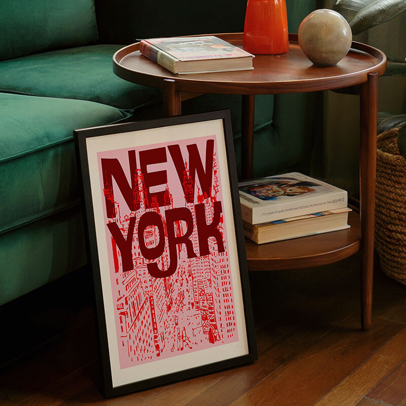new york city pink art print by luxe poster co in black frame
