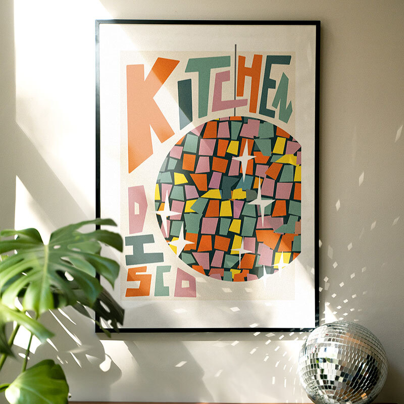 Retro kitchen disco art print by natalie cass in black frame