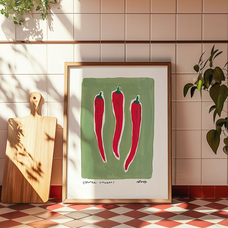 Three chillis art print by natalie cass in oak frame