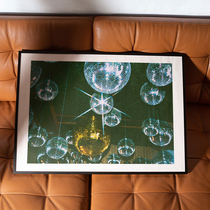 disco ball ceiling art print by sammy hearn in black frame