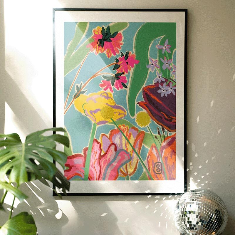 colourful flowers meditation art print by sandra poliakov in narrow black frame