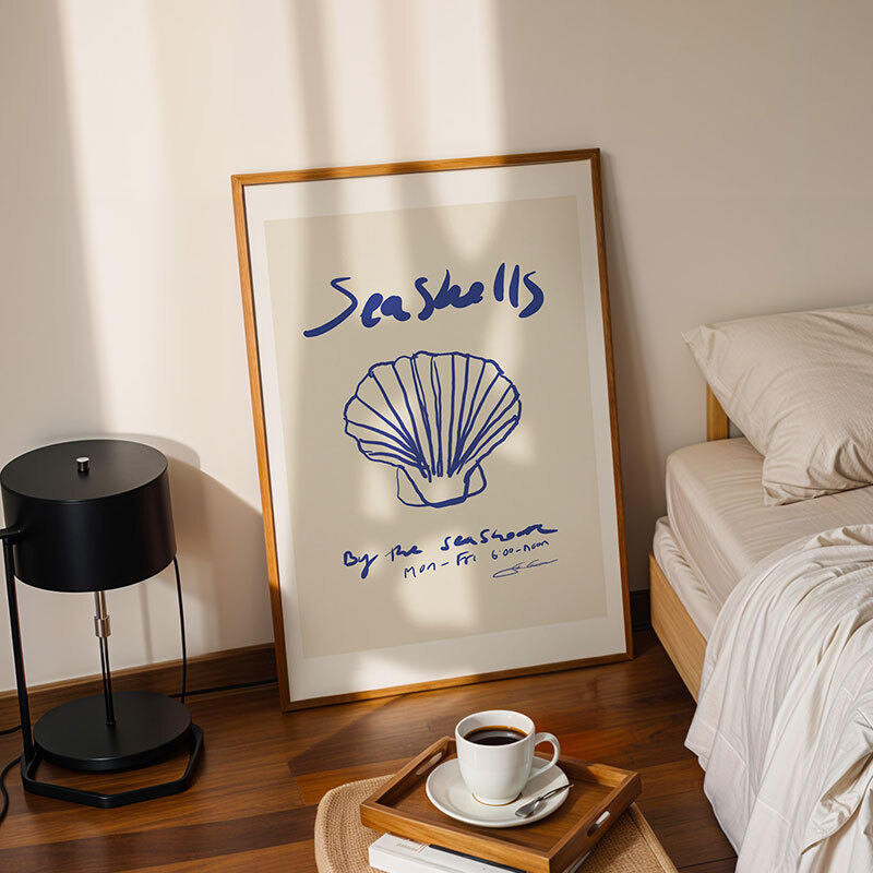 seashells art print by stephie cardona in oak frame
