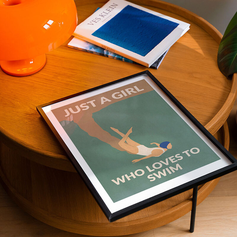 just a girl who loves to swim art print by wall chart in black frame