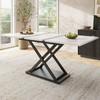 Extendable faux marble dining table with sturdy metal legs, ideal for modern spaces.
