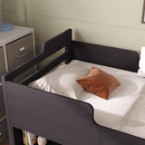 Bed frame with safe curved corners and guard rails