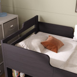 Bed frame with safe curved corners and guard rails