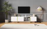 Modern white and gold TV stand with ample storage, adjustable shelves, and cable management.