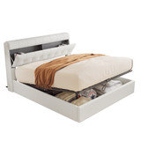 A wooden frame with hydraulic lift and hidden storage.