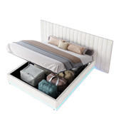 A hydraulic storage bed with velvet upholstery and LED tufted headboard.
