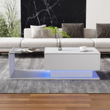 A coffee table with a glass top, storage drawers, and RGB LED lighting.