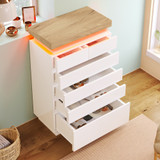A modern high-gloss chest of drawers with LED lighting and ample storage.