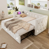 Elegant upholstered daybed with USB/Type-C charging and pull-out trundle.