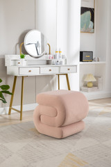 Luxurious velvet ottoman with sturdy wood frame, high-density foam, and versatile use.