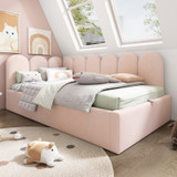Pink velvet daybed with storage, perfect for small spaces.