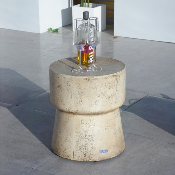 A stylish waterproof cylindrical coffee table with a natural wood look