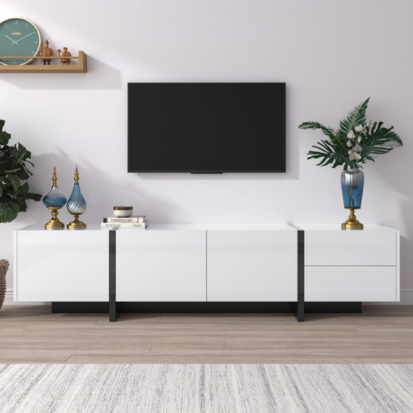 A modern black and white TV cabinet with high-gloss finish, color-blocking design, and spacious storage.