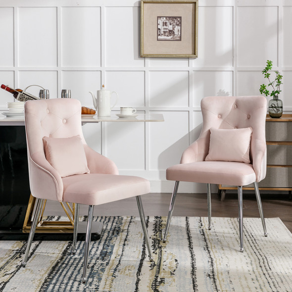 A modern dining chair with velvet upholstery, ergonomic design, and stylish metal legs.