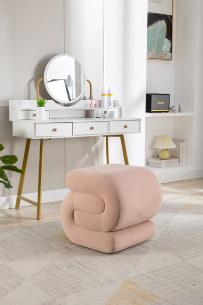 Luxurious velvet ottoman with sturdy wood frame, high-density foam, and versatile use.