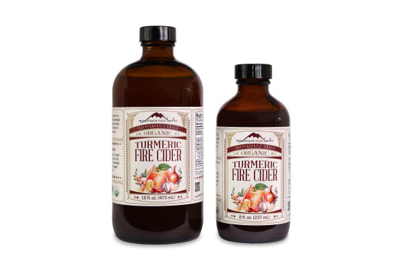 Turmeric fire cider in amber glass bottles