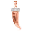 Tiger tooth fang pendant in rose gold, with diamonds.