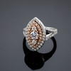 Marquise-shaped double halo diamond engagement ring in 14k white and rose gold.