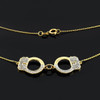 Handcuffs necklace with diamond accents in 14k yellow gold.