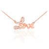 Love heart necklace with diamonds in 14k rose gold.