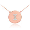 Letter "I" disc necklace with diamonds in 14k rose gold.