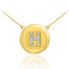 Letter "H" disc necklace with diamonds in 14k yellow gold.