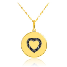 Heart disc pendant necklace with black diamonds in 14k gold.