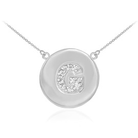 Letter "G" disc necklace with diamonds in 14k white gold.