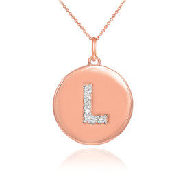 Letter "L" disc pendant necklace with diamonds in 14k rose gold.