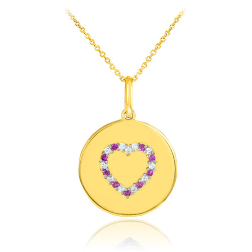Heart disc pendant necklace with diamonds and rubies in 14k gold.