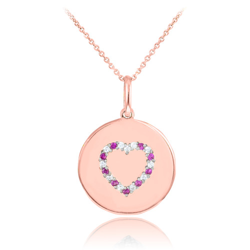 Heart disc pendant necklace with diamonds and rubies in 14k rose gold.