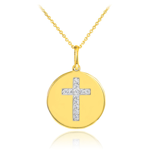 Cross disc pendant necklace with diamonds in 14k gold.