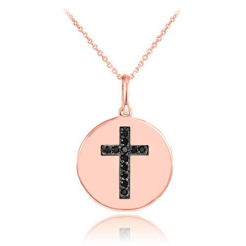 Cross disc pendant necklace with black diamonds in 14k rose gold.