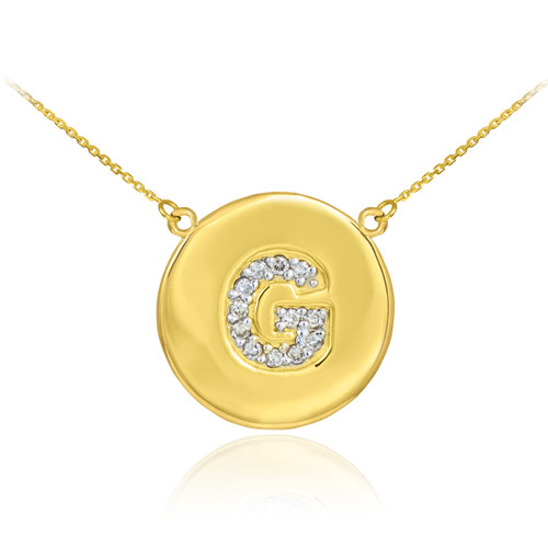 Letter "G" disc necklace with diamonds in 14k yellow gold.