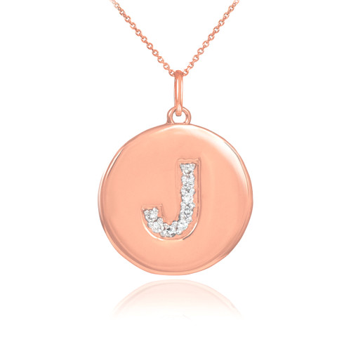 Letter "J" disc pendant necklace with diamonds in 14k rose gold.