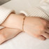 14K Yellow Gold Tube Link Cut Bracelet 7" on female model