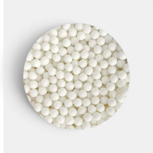 White sugar ball sprinkles for cake decorating, cupcakes, cookies and dessert decorations.