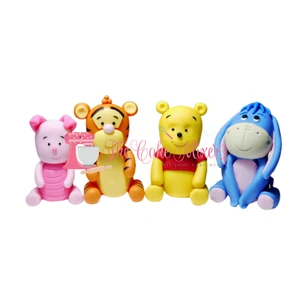 Handmade gumpaste Pooh, Piglet, Tigger and Eeyore cake decorations available individually or as a set of four.
