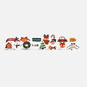 Christmas Cupcake Picks 15 Piece Set featuring assorted colourful Santa Claus, Christmas tree, wreath, gift and festive greeting decorations for Christmas cupcakes.