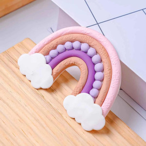 Textured Rope Silicone Mould, colorful rainbow silicone mould with pink, purple, and peach textured ropes and white clouds on a wooden surface. Textured Rope Silicone Mould, colorful rainbow silicone mould with pink, purple, and peach textured ropes and white clouds on a wooden surface.