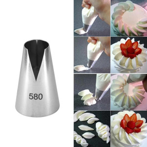 TM Cake Supplies Piping Tip #580 – Petal & Leaf Icing Nozzle, a metal cake decorating piping nozzle used for creating petal and leaf designs in desserts. TM Cake Supplies Piping Tip #580 – Petal & Leaf Icing Nozzle, a metal cake decorating piping nozzle used for creating petal and leaf designs in desserts.