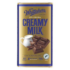 Whittakers Whittaker’s Creamy Milk 33% Cocoa – Smooth & Classic, chocolate bar with pieces and a small jug of milk on the packaging. Whittakers Whittaker’s Creamy Milk 33% Cocoa – Smooth & Classic, chocolate bar with pieces and a small jug of milk on the packaging.